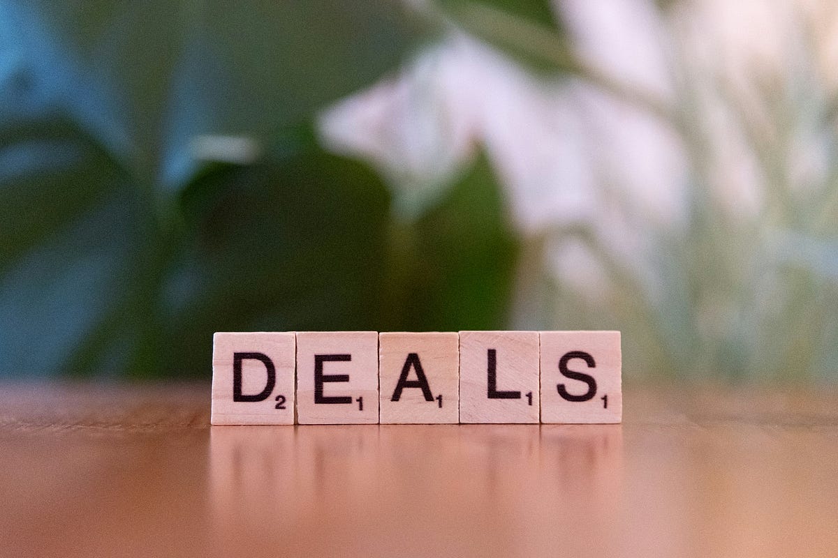 The word “DEALS” on a Table The word “DEALS” on a Table