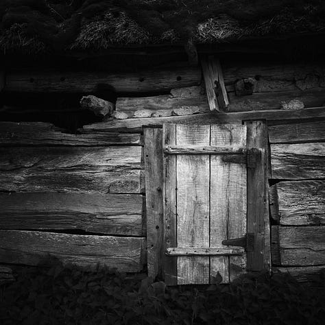 Six black and white square images that have caught my eye, left to right top row - a stack of chairs, a stack of roofing tiles, the open window in my room, an old tyre leaning against a tree with flwoers growing around it, the door of an old wooden barn and a pipe with a curve to a tap