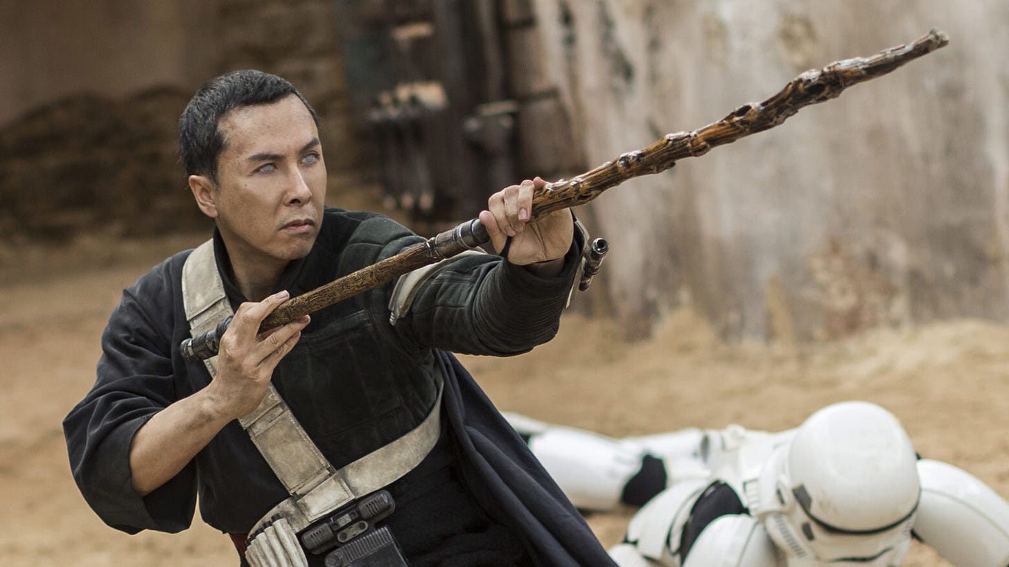 Chirrut Îmwe defeating a squad of Stormtroopers in Rogue One: A Star Wars Story