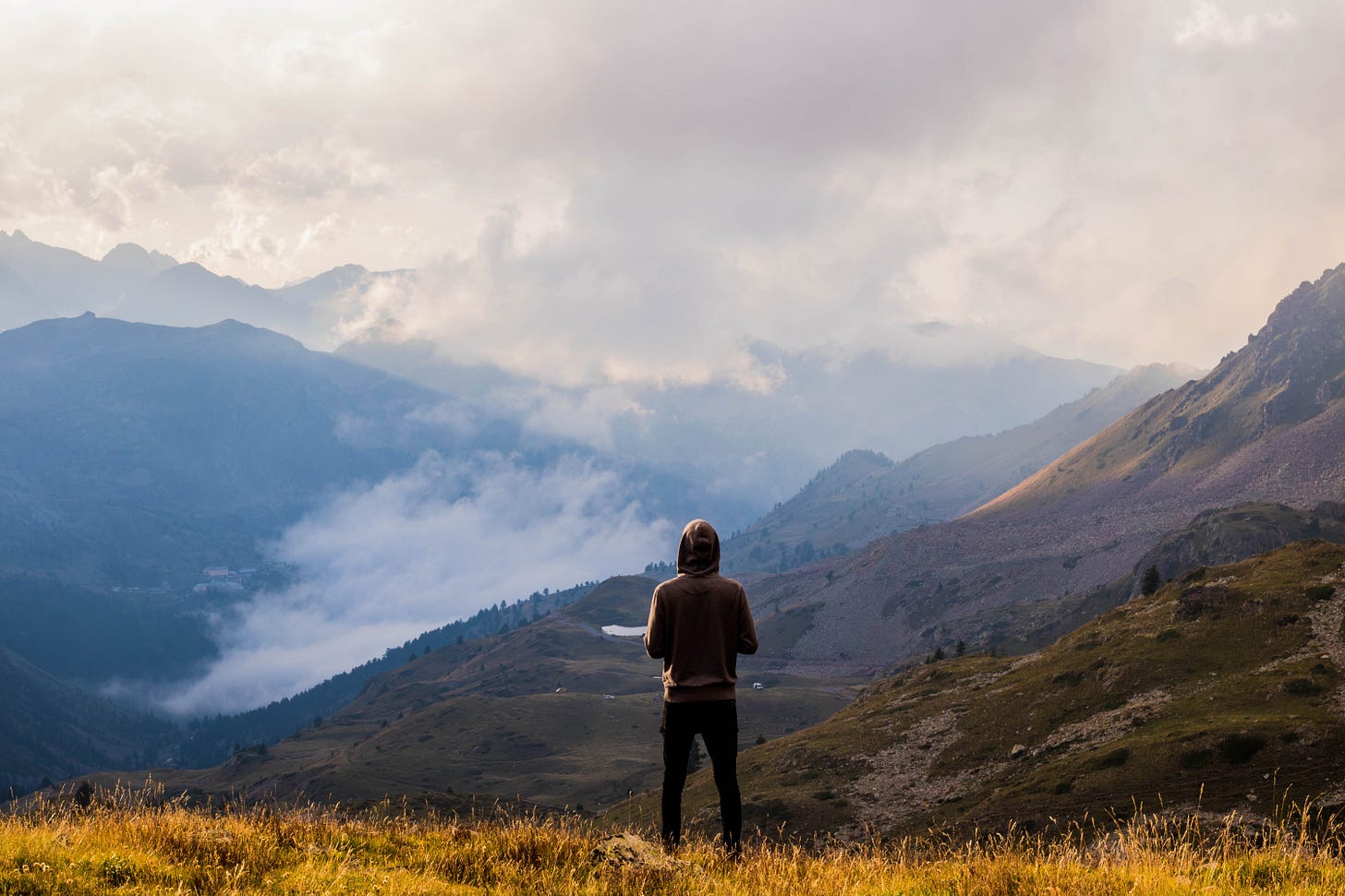 https://www.pexels.com/photo/person-wearing-brown-pullover-and-black-jeans-standing-on-mountain-top-with-the-scenic-view-3163927/ https://www.pexels.com/photo/person-wearing-brown-pullover-and-black-jeans-standing-on-mountain-top-with-the-scenic-view-3163927/