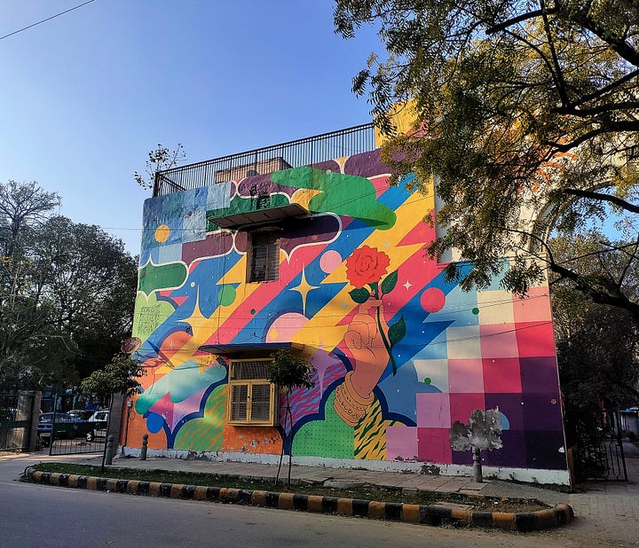 4 images of colourful murals of walls in Delhi