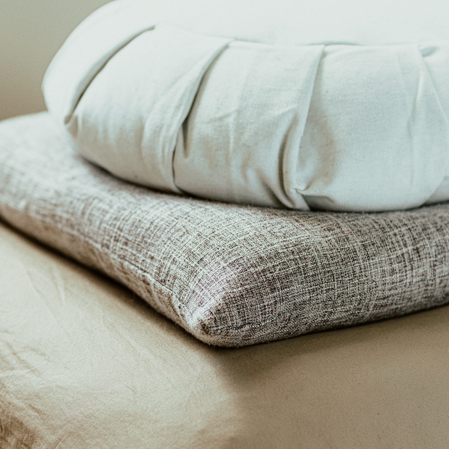 Meditation cushion, work exchange at yoga studios in Paris, France