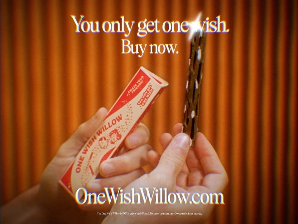 A commercial of One Wish Willow to promote Obsession (2026), showing a pair of hands holding novelty toy with the phrase "You one get one wish." A commercial of One Wish Willow to promote Obsession (2026), showing a pair of hands holding novelty toy with the phrase "You one get one wish."