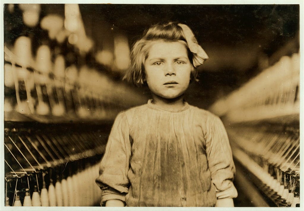A little spinner in Globe Cotton Mill. Augusta, Ga. The overseer admitted she was regularly employed. Location: Augusta, Georgia. | Library of Congress A little spinner in Globe Cotton Mill. Augusta, Ga. The overseer admitted she was regularly employed. Location: Augusta, Georgia. | Library of Congress