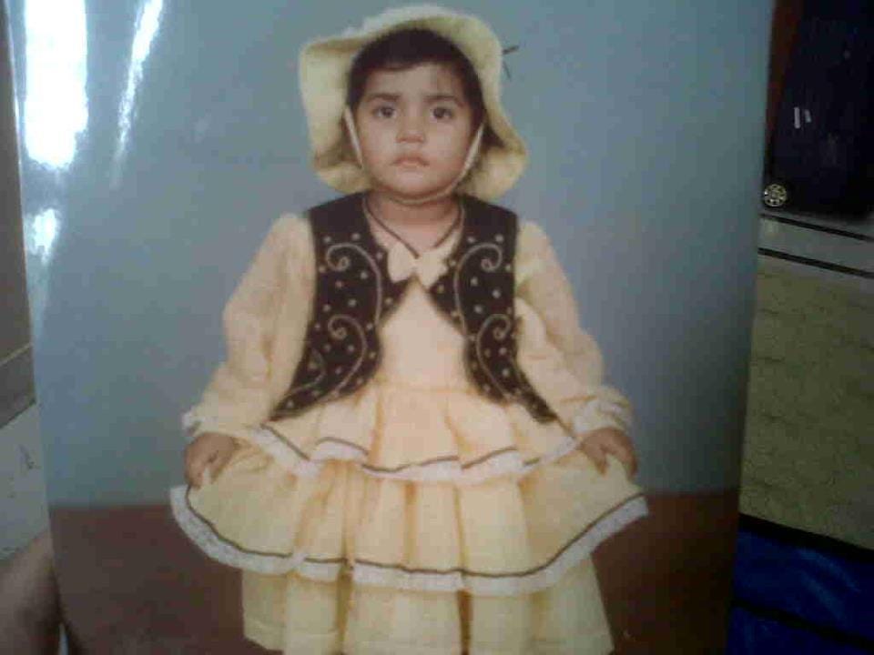 Circa 1992 - definitely coerced to pose