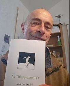 Andrew Squire with All Things Connect, the first graphic novel published by Mensch Publishing. Andrew Squire with All Things Connect, the first graphic novel published by Mensch Publishing.