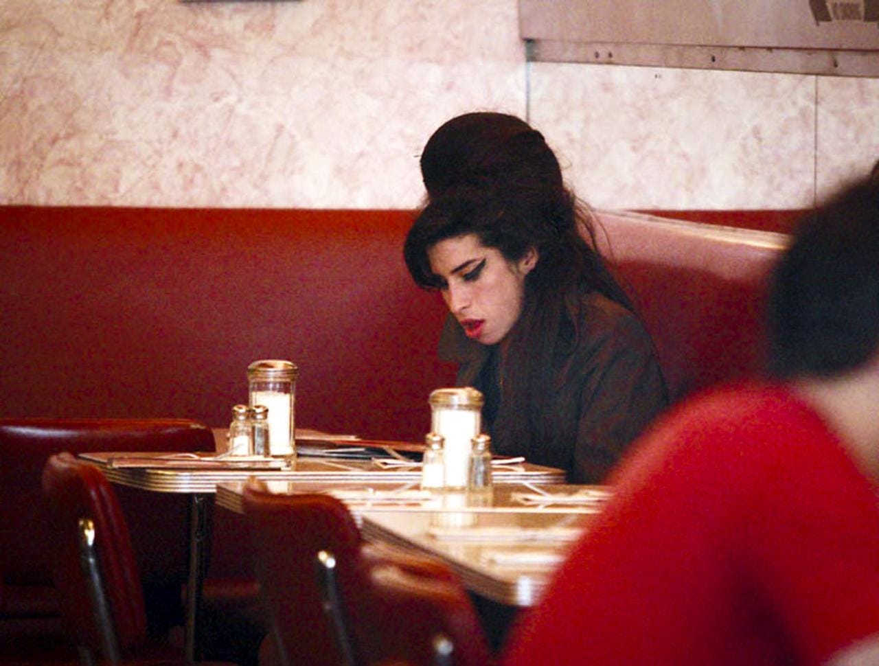 The late singer Amy Winehouse at the now-bygone Florent restaurant on Gansevoort Street.