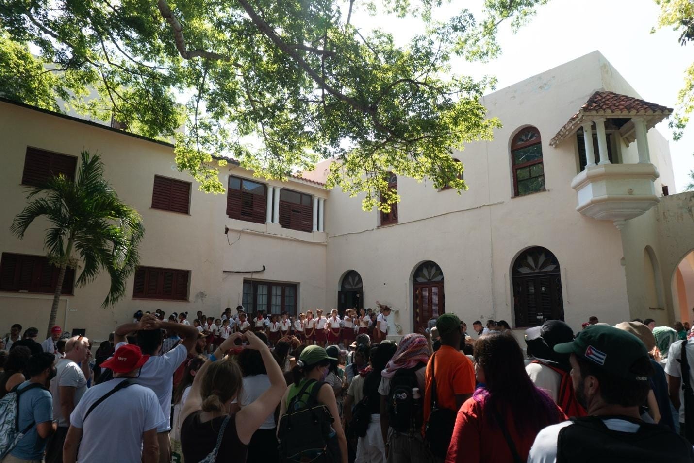 A group of people outside of a building
AI-generated content may be incorrect. A group of people outside of a building
AI-generated content may be incorrect.