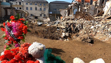 Leyla, 4, a Ganja massacre survivor and her former home. 