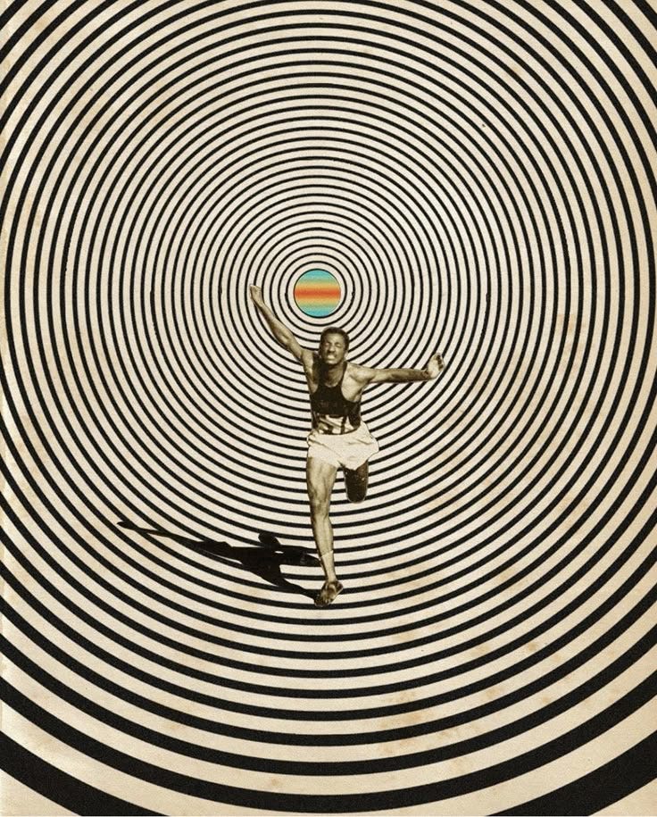 This may contain: a man standing in front of a black and white circular pattern