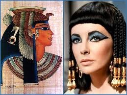 (L) Elizabeth Taylor portraying Cleopatra