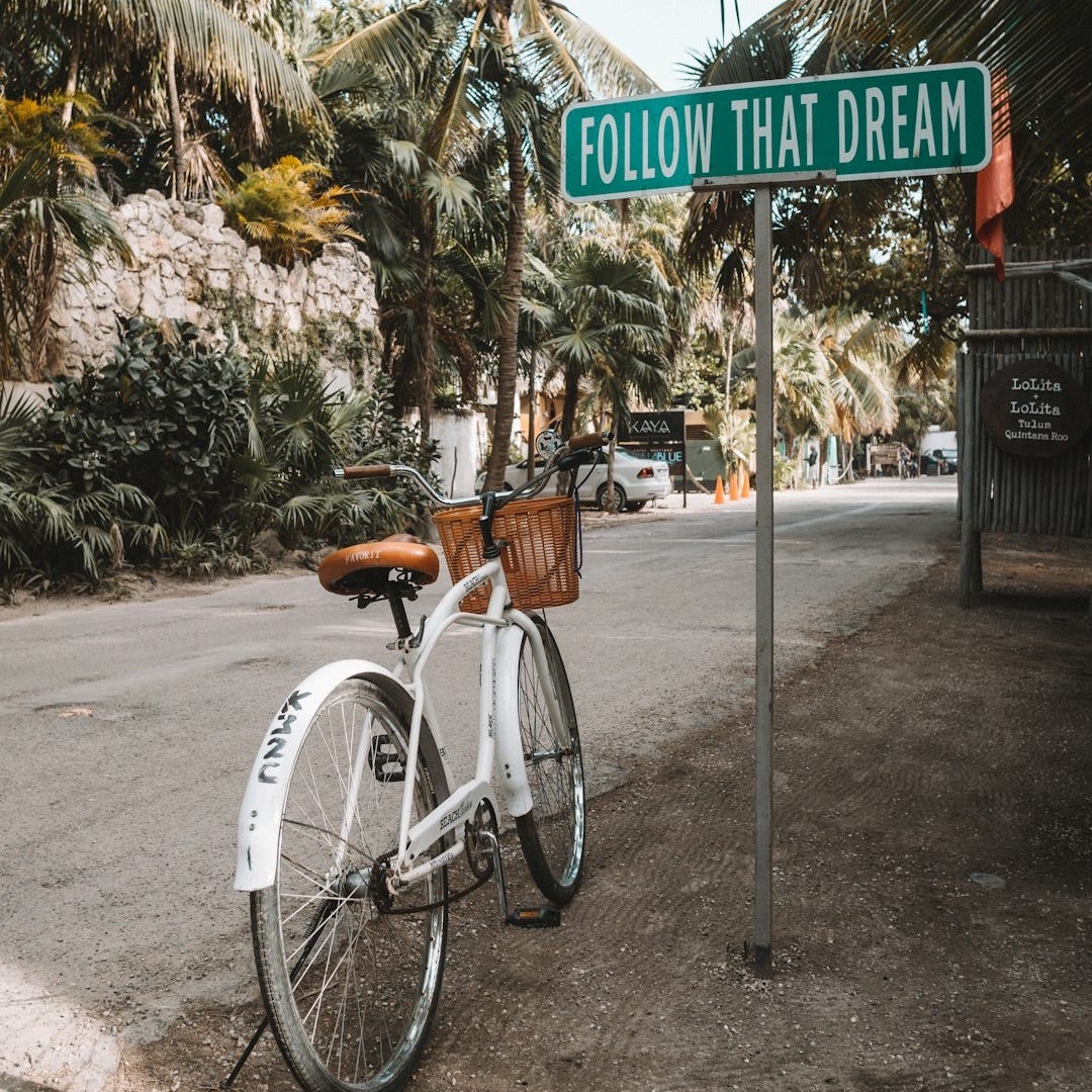 parked white bicycle