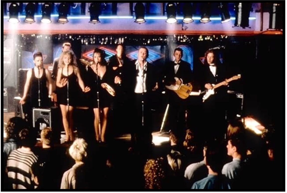 The Commitments perform on-stage to an enthusiastic crowd in a scene from the movie, "The Commitments."