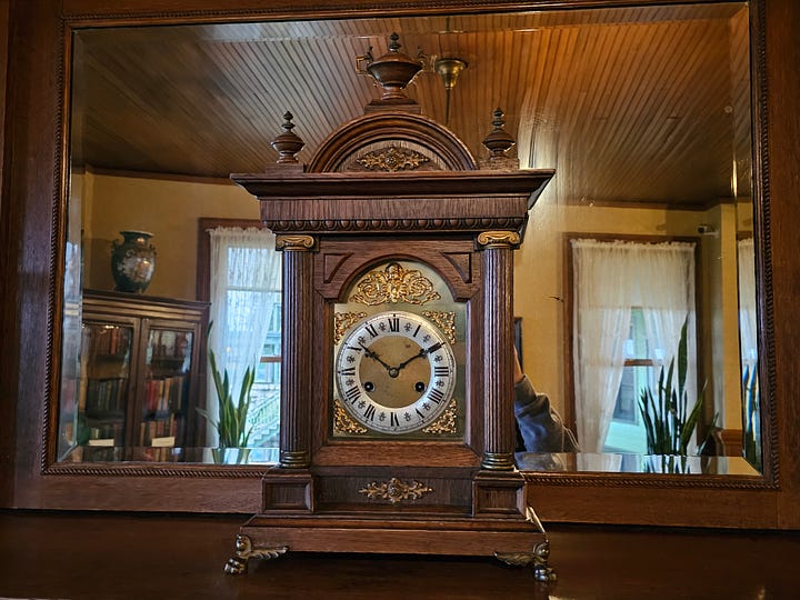 Images of the inside of Mohonk Mountain House, including a colorful Tiffany lamp, an ornate wooden fireplace with 2 portraits above, an antique clock, and a sign that says Afternoon Tea & Cookies.