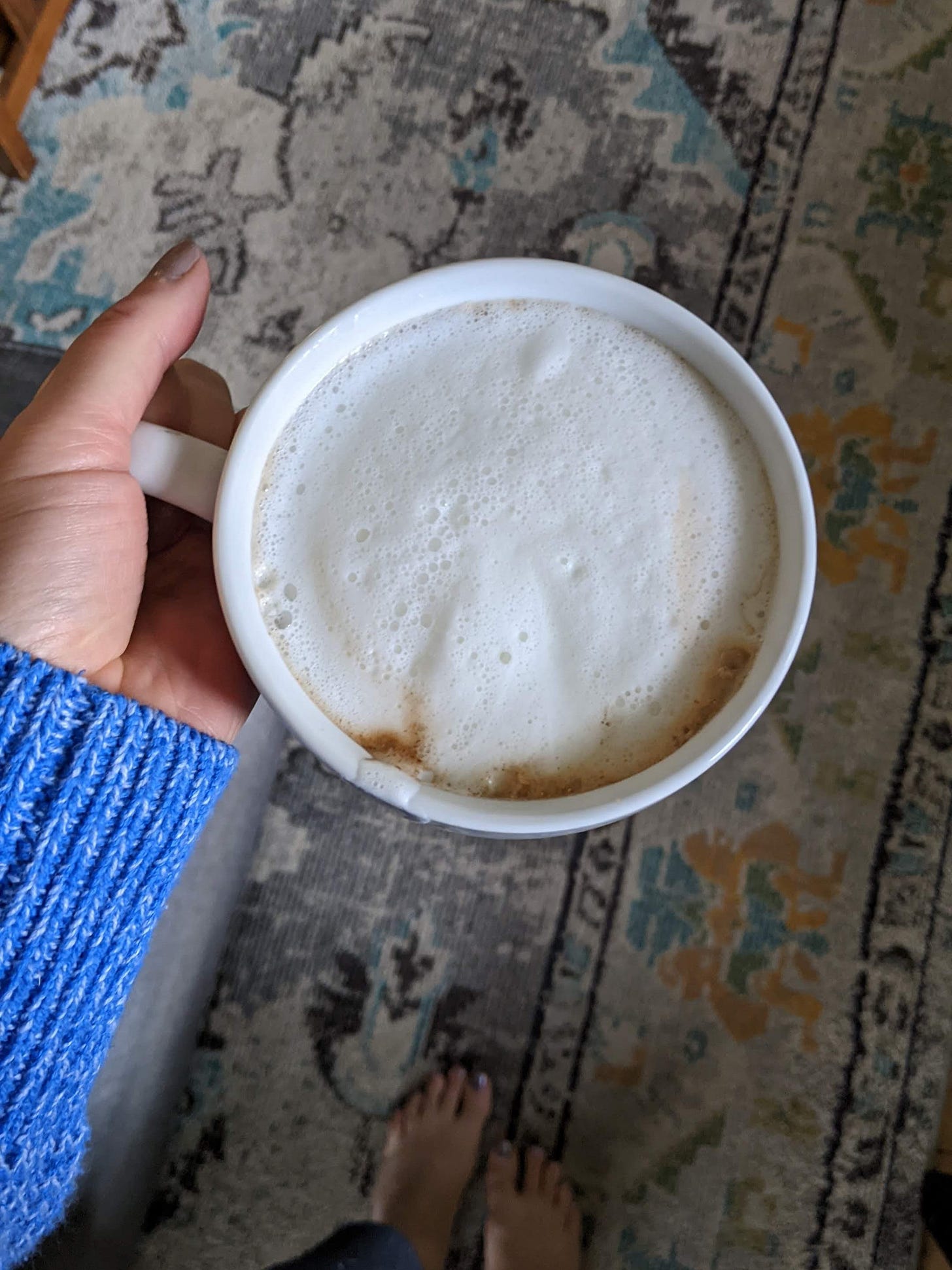 a frothy cup of coffee