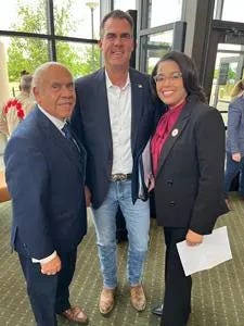 From left, Oklahoma Hispanic Institute Founder/Chairman Fred Mendoza, Oklahoma Gov. Kevin Stitt and Dr. Mautra Staley Jones, president of OCCC