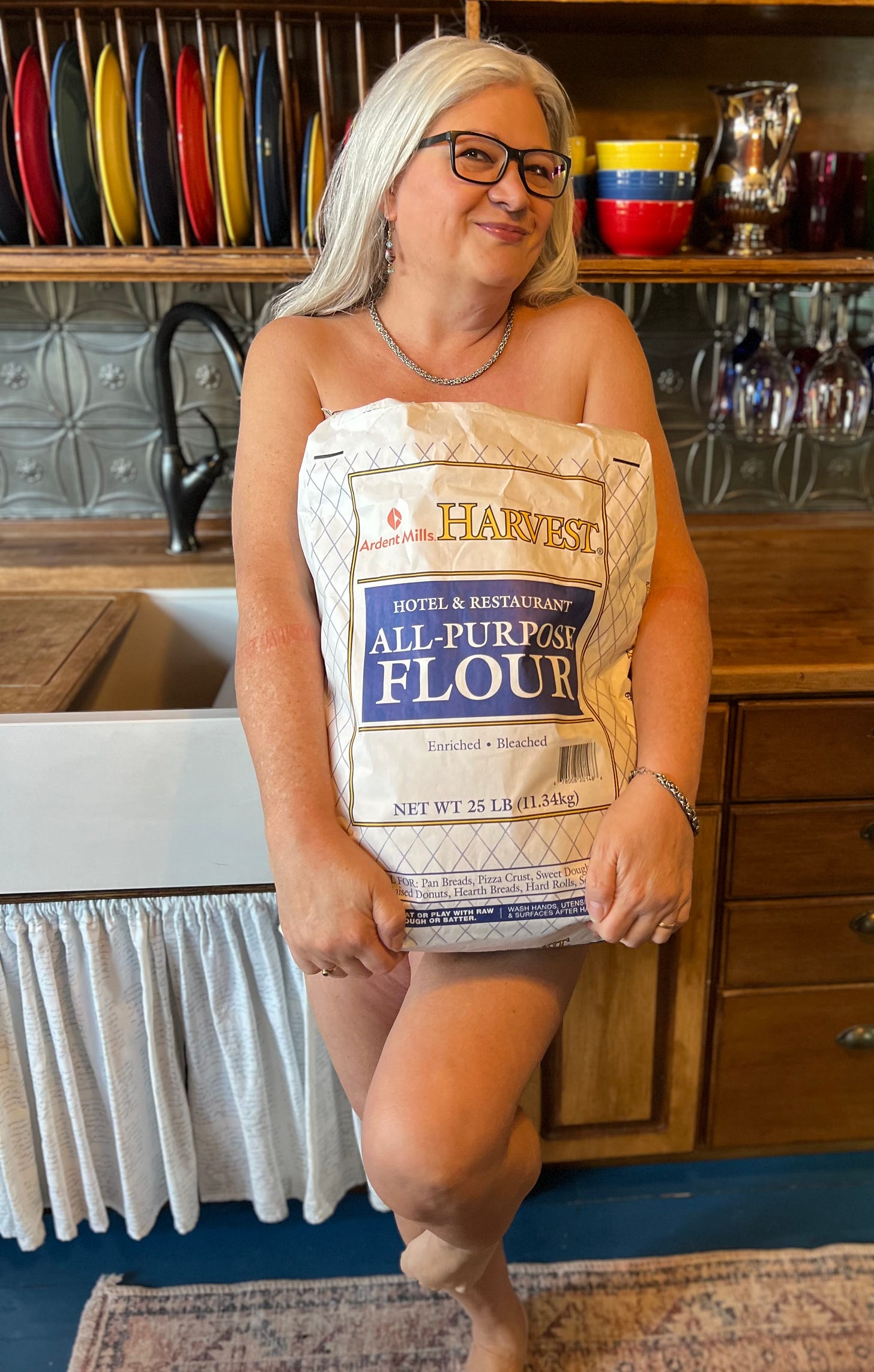 Michelle Teheux poses with a bag of flour Michelle Teheux poses with a bag of flour