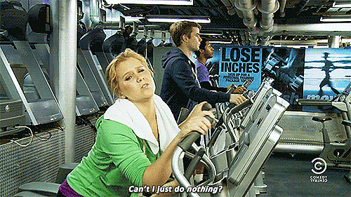 Amy Schumer working out on an elliptical GIF