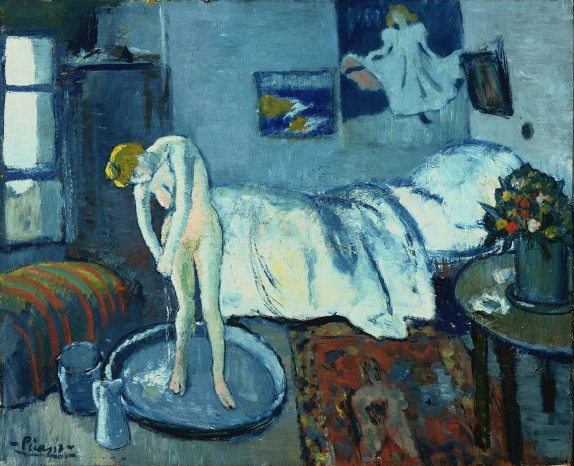 Woman bathing in a blue interior