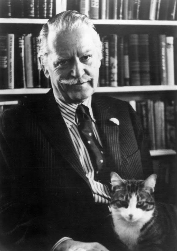 Willard Espy poses with his cat