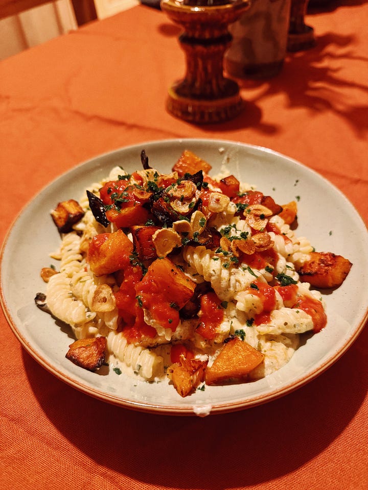 four photos, featuring stonehenge, a bowl full of colourful pasta, a sugar-coated pastry and coffee, and a hand holding cards for a board game.
