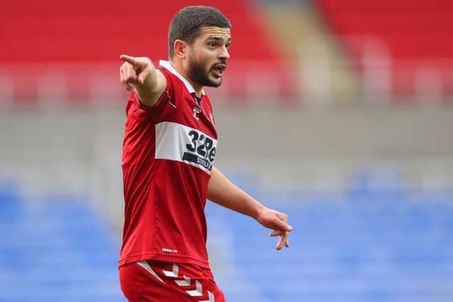 Sam Morsy in a Middlesbrough shirt, pointing