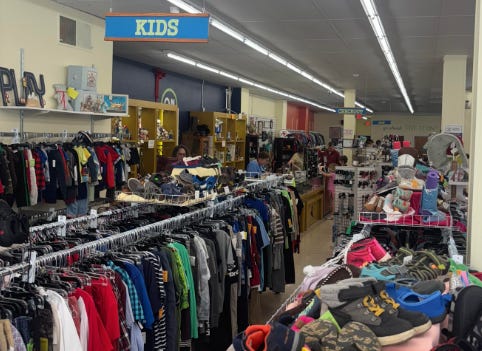 A store with many clothes

AI-generated content may be incorrect.