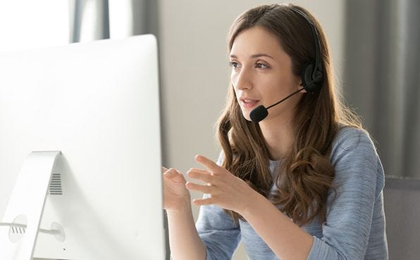 a registered nurse providing phone support to a patient