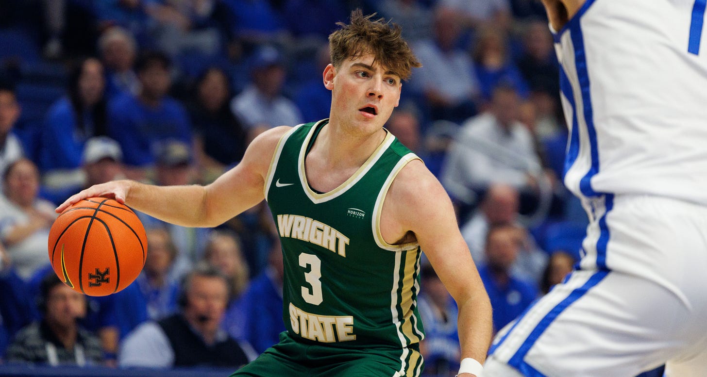 Wright State Raiders guard Alex Huibregtse (3) handles the ball against the Kentucky Wildcats at Rupp Arena