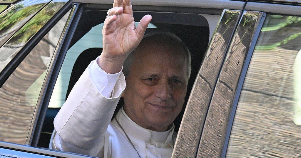 Pope Leo XIV waves from a car window Pope Leo XIV waves from a car window