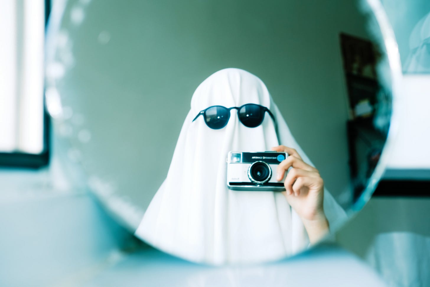 Ghost Holding a Camera Ghost Holding a Camera