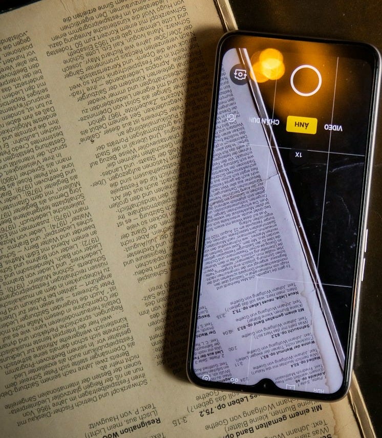silver iphone 6 on white paper