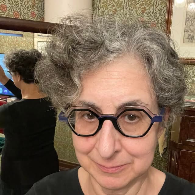 May be an image of 1 person and eyeglasses