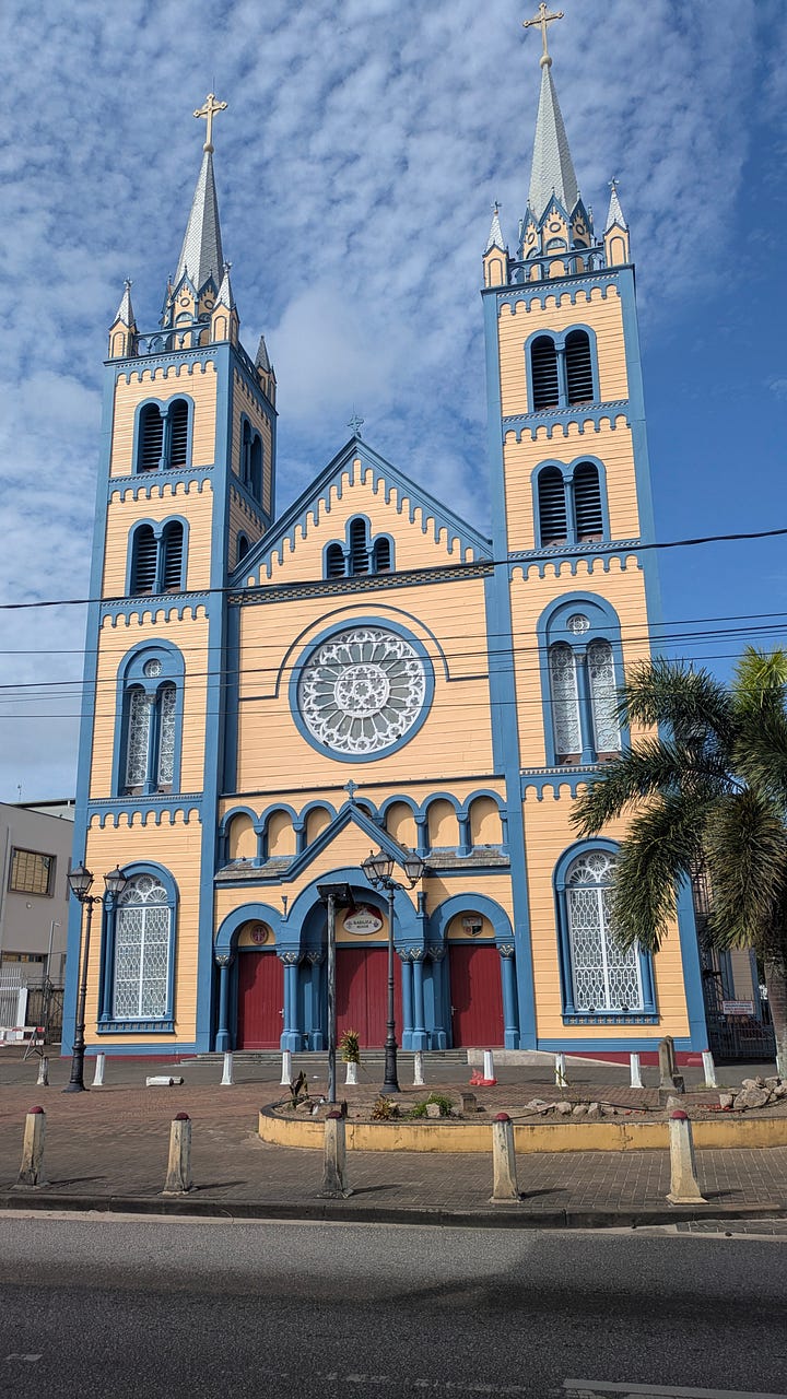 Dinner in the staffroom (left); A funky church out and about in Paramaribo (right)