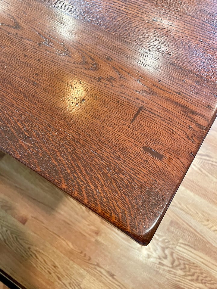 Distressed oak wood and a cardboard template.