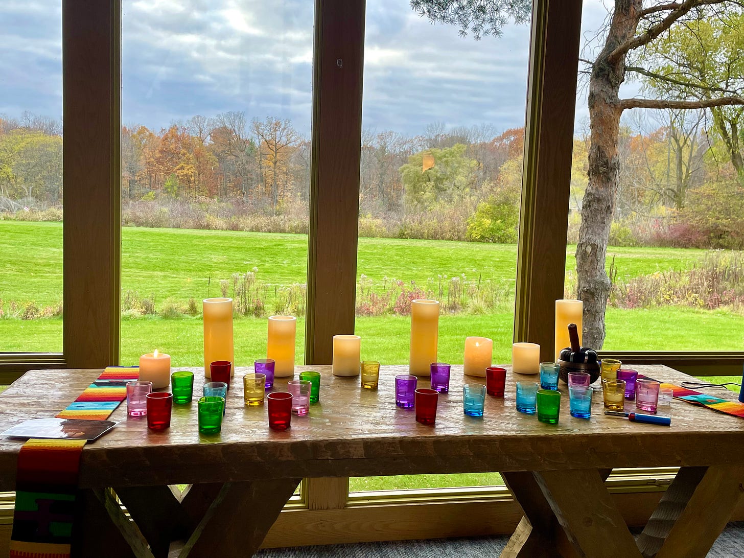 many colored votives for All Saints Day