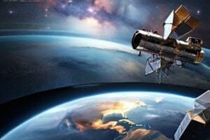 An illustration depicting the Hubble and James Webb space telescopes orbiting Earth, with a window-like interface displaying real-time information about their current observations. The background shows a stunning view of a nebula or galaxy, representing the cosmic wonders being explored by these powerful observatories.