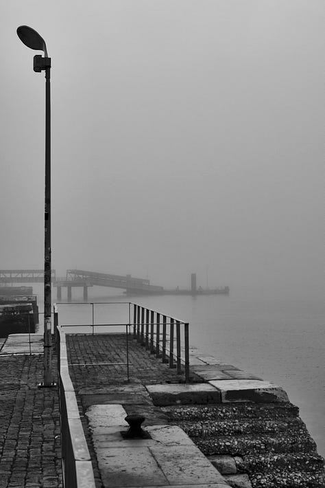 Black and white views of fog over the riverside, Lisbon