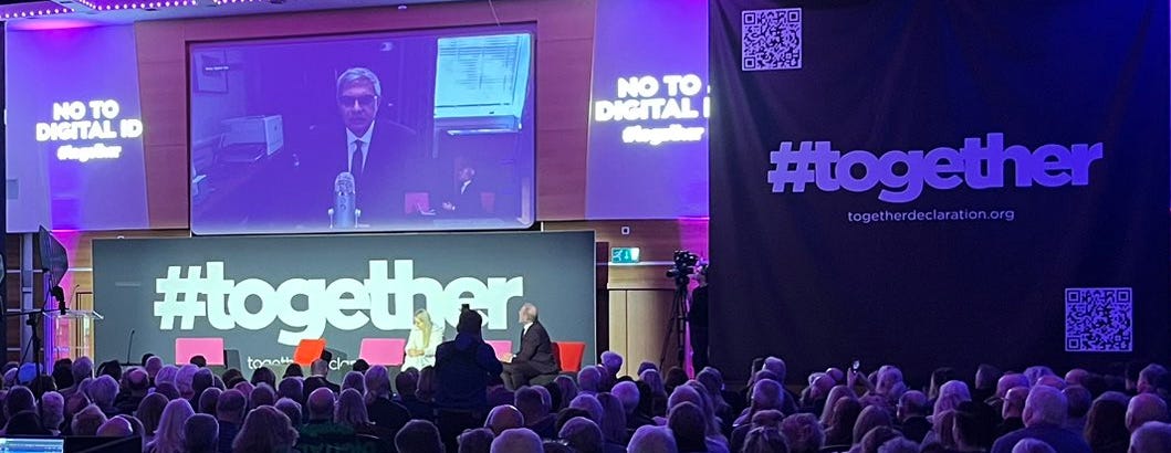 Jay Bhattacharya speaking remotely at the anti-Semitic "together" hate rally in London, Nov. 16