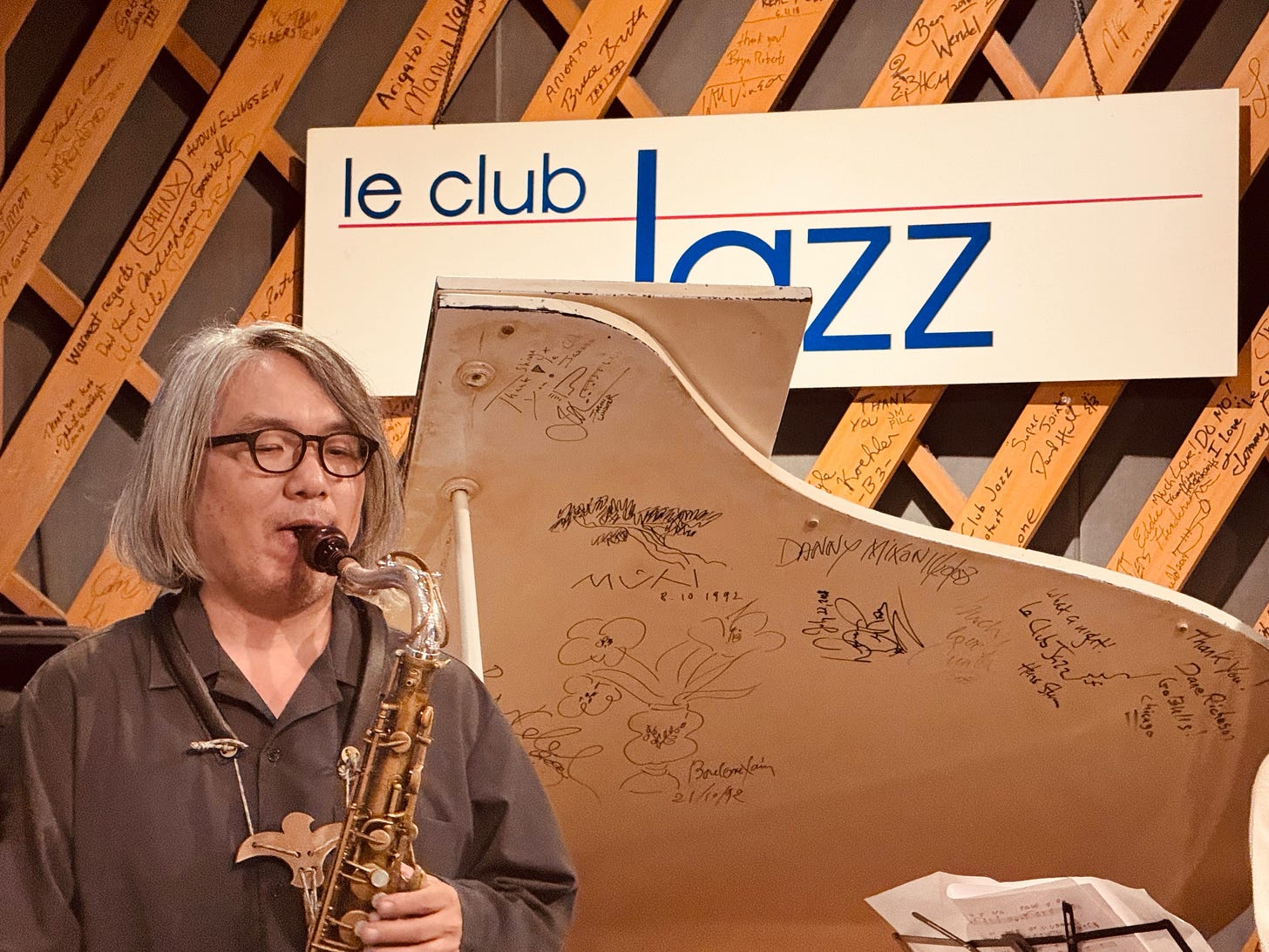 A person playing a saxophone

AI-generated content may be incorrect.