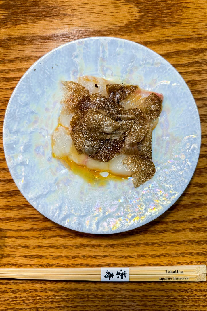 Chef Taka shaving summer truffles over shiromi white fish; uni with caviar and beef collagen and the beef stew in tomato sauce
