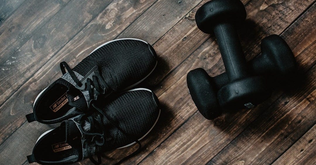 pair of black running shoes