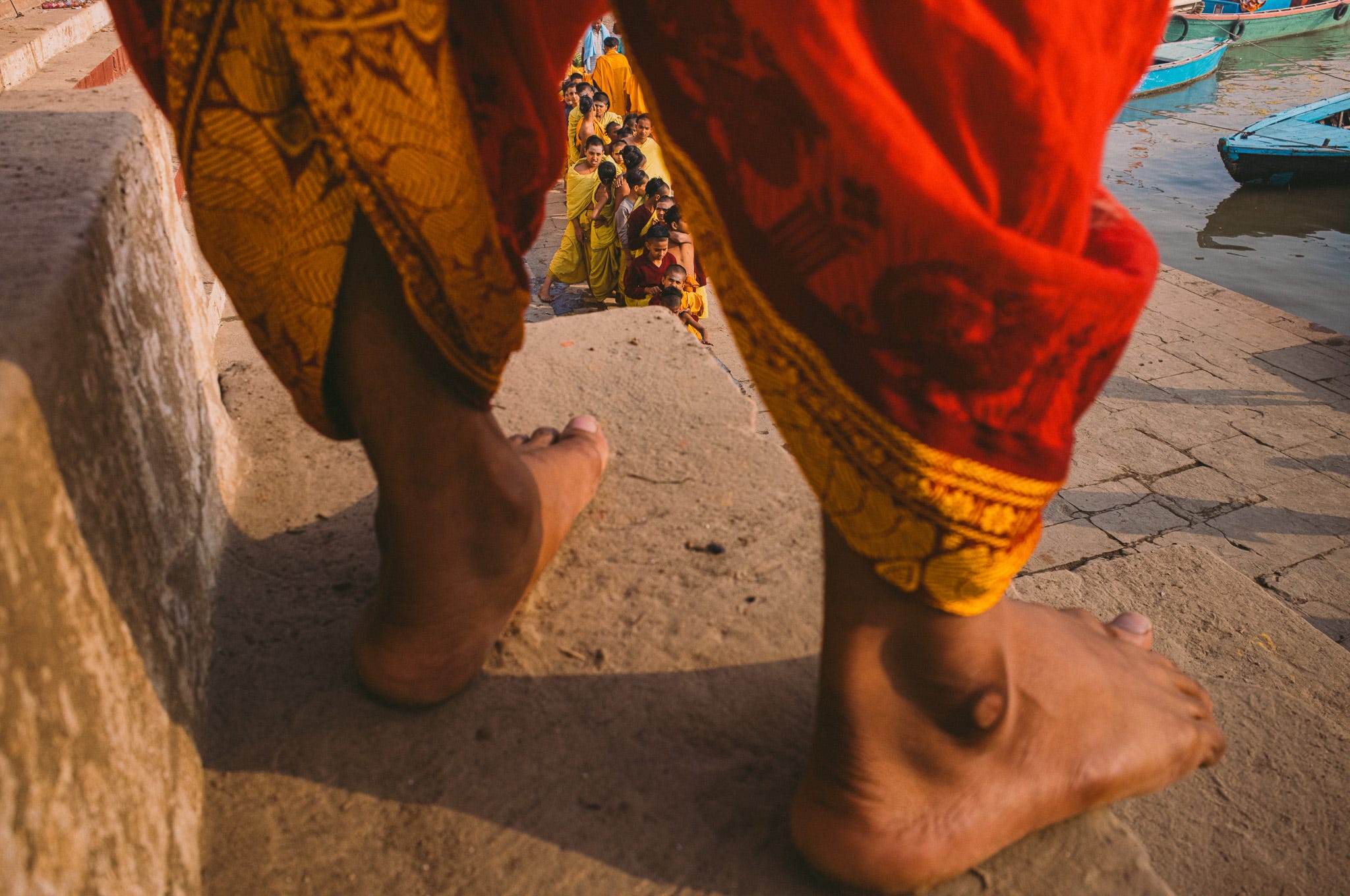 A 28mm allows you to experiment with both foreground and background. This photograph was made at the ghats of Varanasi.