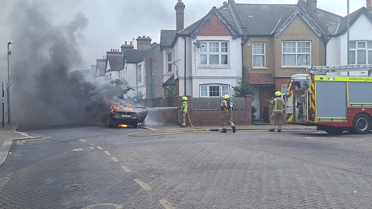 May be an image of 2 people and text