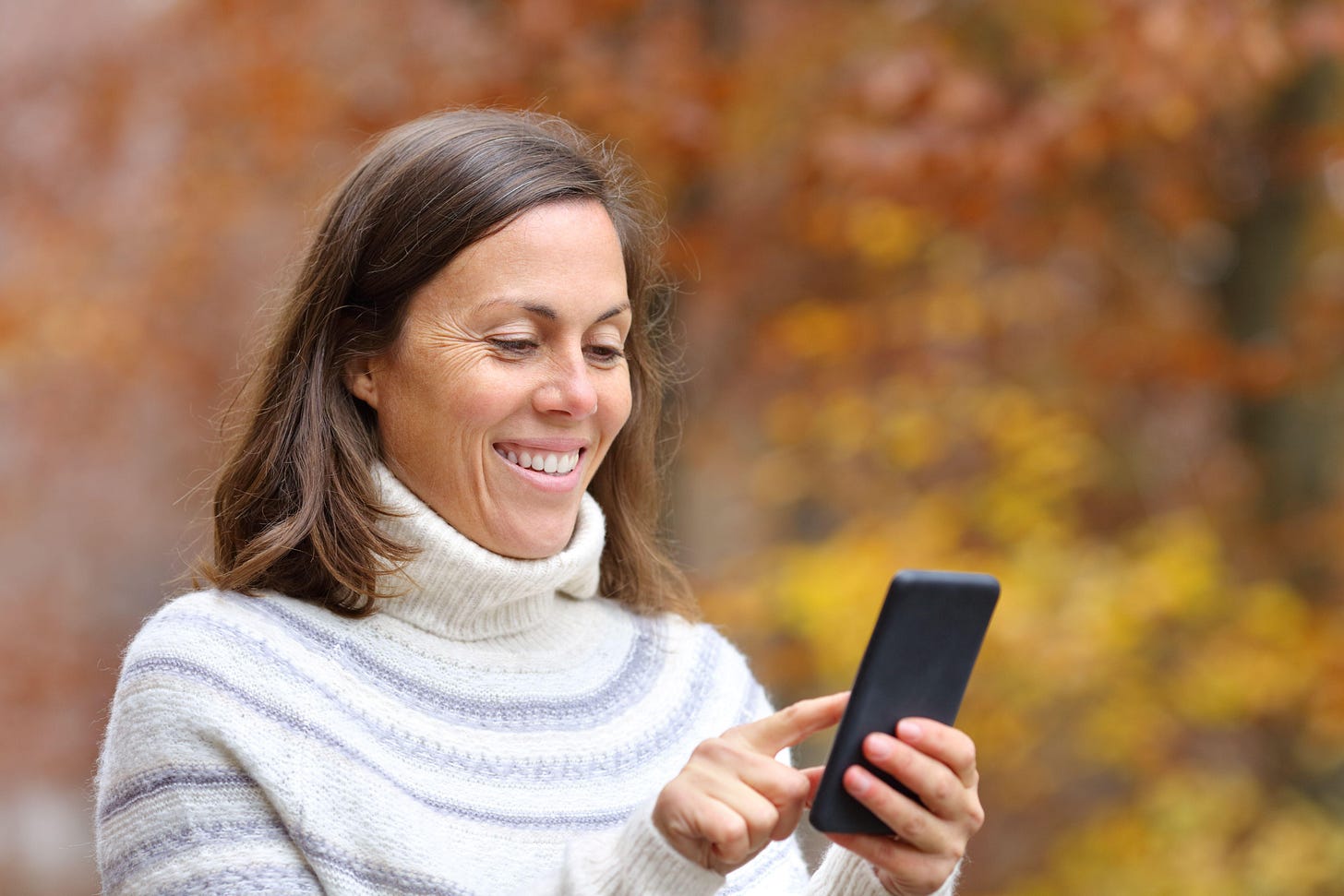 A woman with a phone