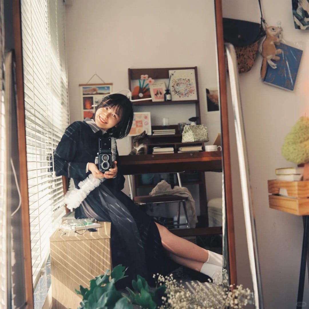 她和她的胶片相机