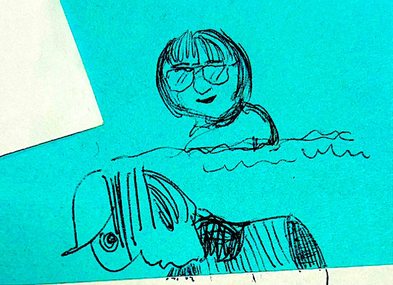 cartoon drawing of a man and a woman on a blue stickie note.