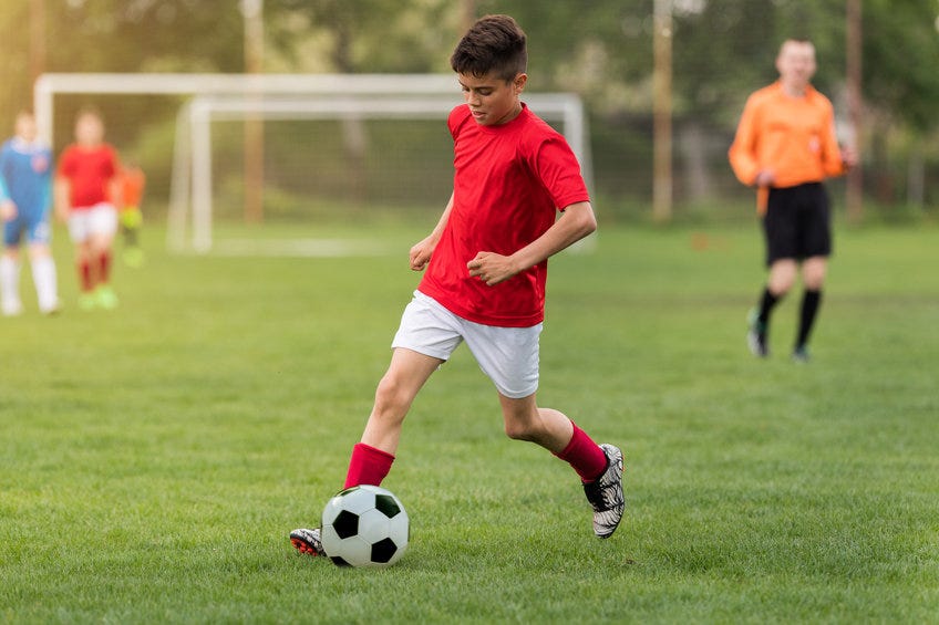 Kids playing soccer