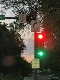 Normally, a red light means you must stop. But a green arrow authorizes you to make a turn. Similar to a constitutional provision authorizing Congress to pass legislation.