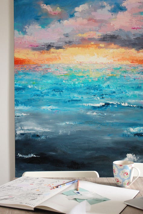 Series of oil paintings by Julia Bethan, blues, pinks and whites. Paintings are abstract oils of landscapes and stars.